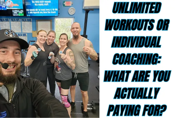 Coach providing individualized feedback during semi-private personal training