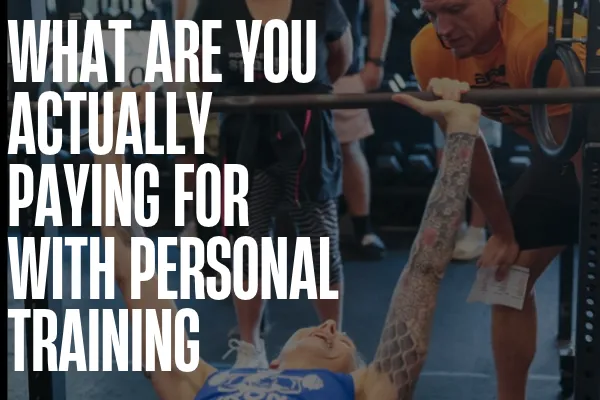 BFP coach working one-on-one with an adult client during a personalized strength session