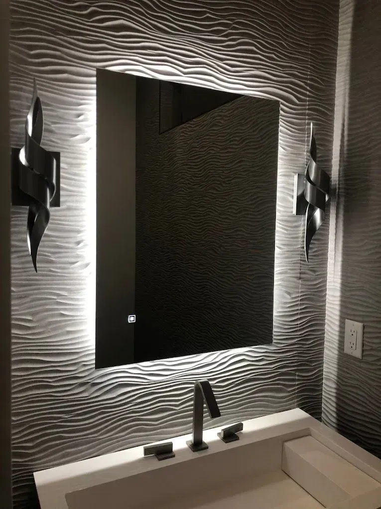 Bathroom vanity with modern LED mirror and lighting – Bee Electrical Contracting new construction installation in Port St. Lucie, FL