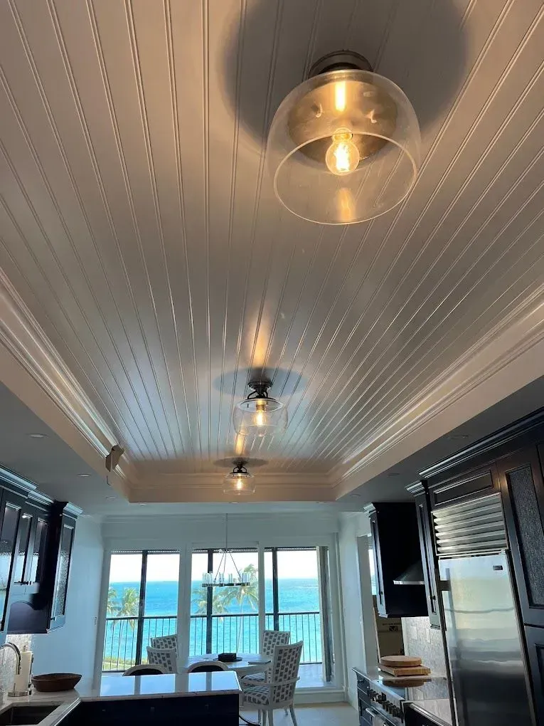 Remodeled dining room featuring updated ceiling lighting and fixtures by Bee Electrical Contracting in Palm Beach Gardens, FL
