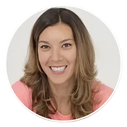 Alicia Jones smiling in a pink top, health and fitness expert for women over 50
