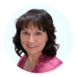 Nancy Showalter with dark hair, certified law of attraction coach