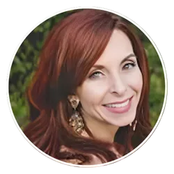 Wendy Collier in a garden setting, soulful business mentor