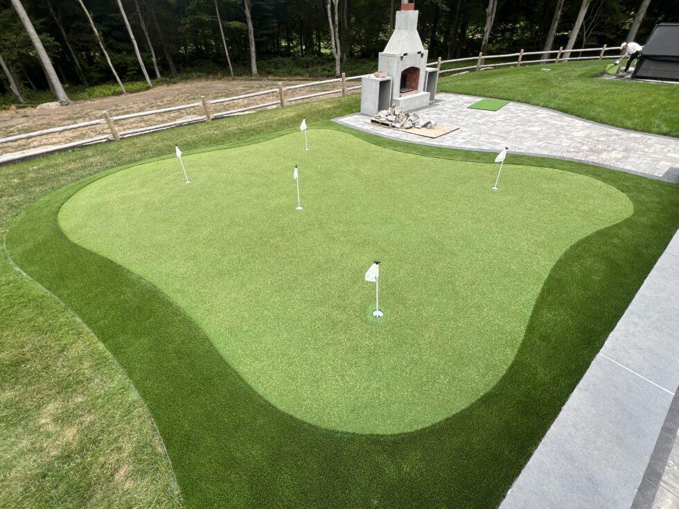 Beautiful pond grasses and lavender with perfect rolling lawn care by Carpenter Landscaping