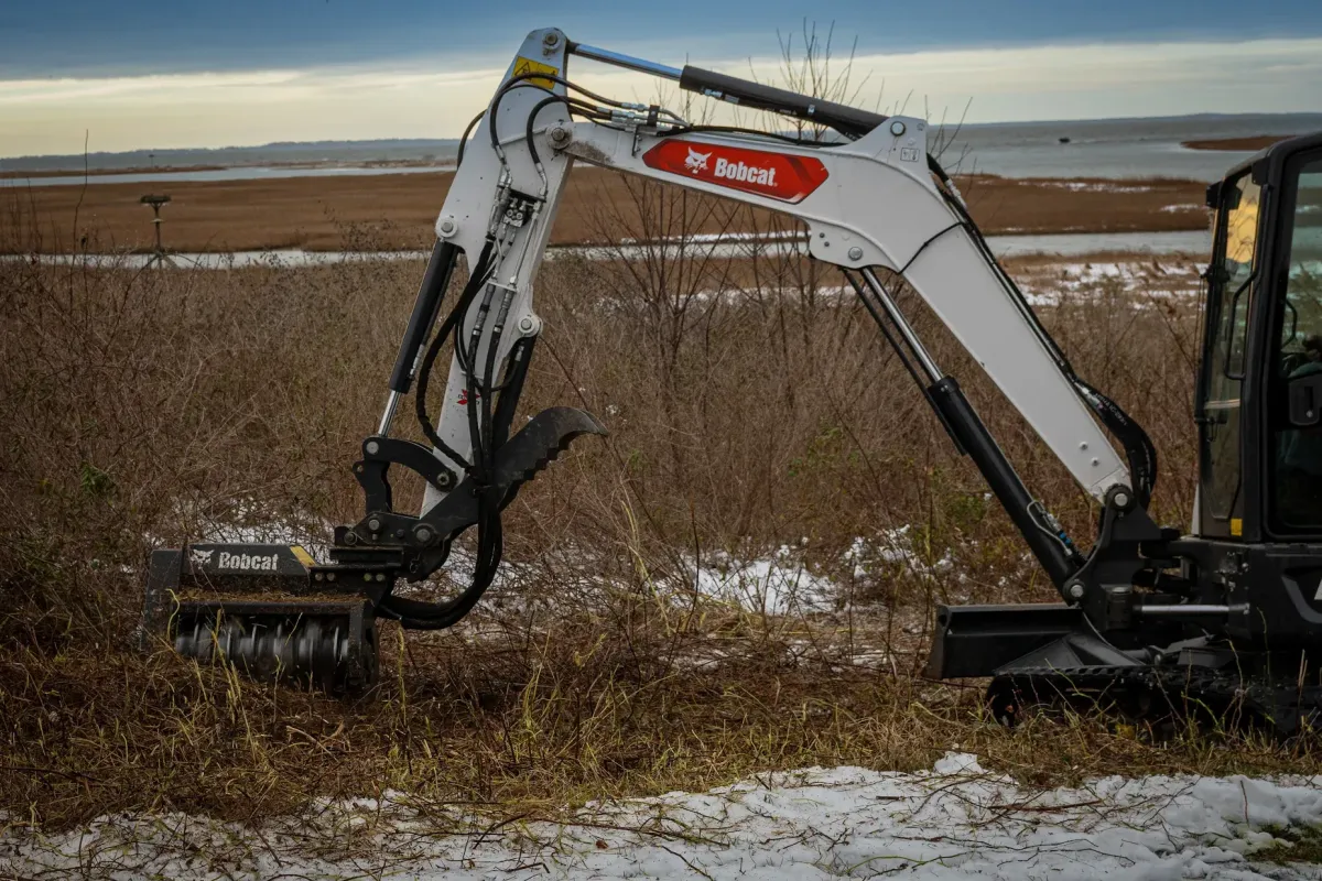 Beautiful pond grasses and lavender with perfect rolling lawn care by Carpenter Landscaping