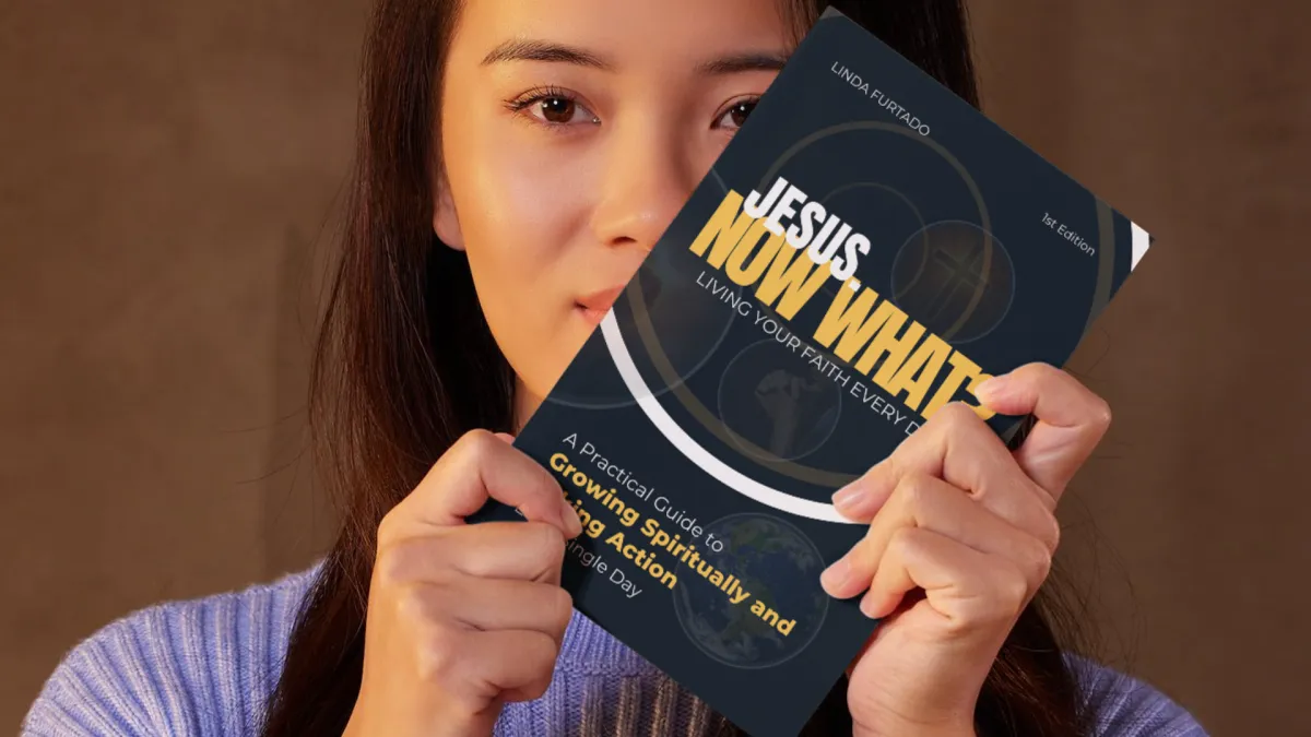 Woman holding the book titled "Jesus. Now What"