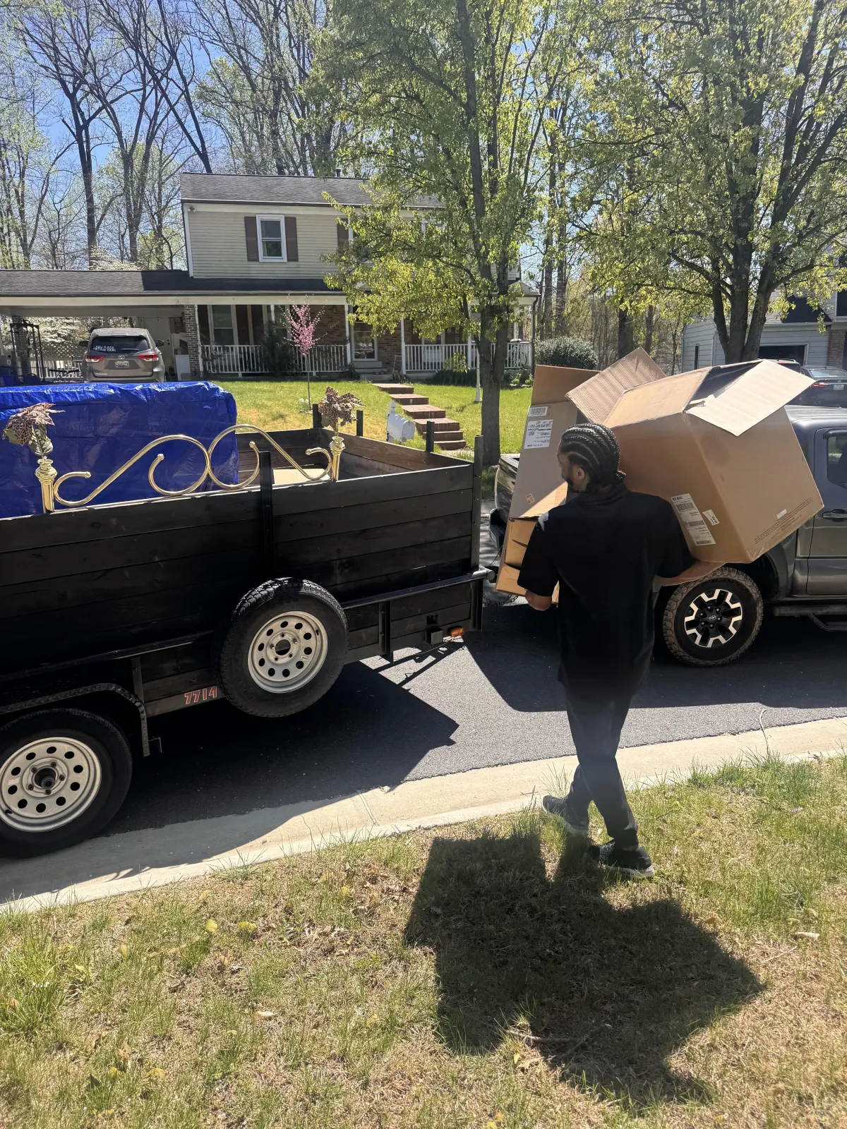 staff member removing garage junk in silver spring