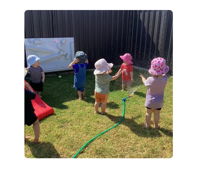 Momentum Early Learning Centre teacher with child