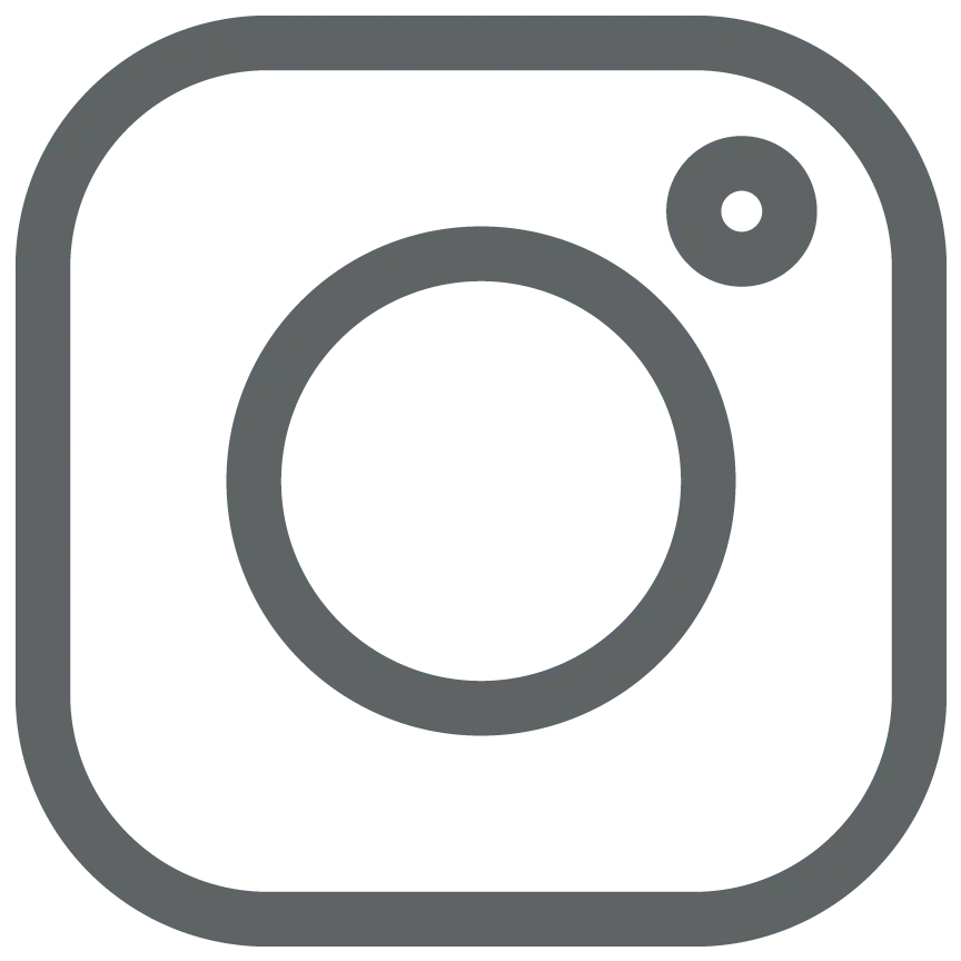 Dark gray outline of a camera with rounded corners and a small circle in the top right, representing Instagram.