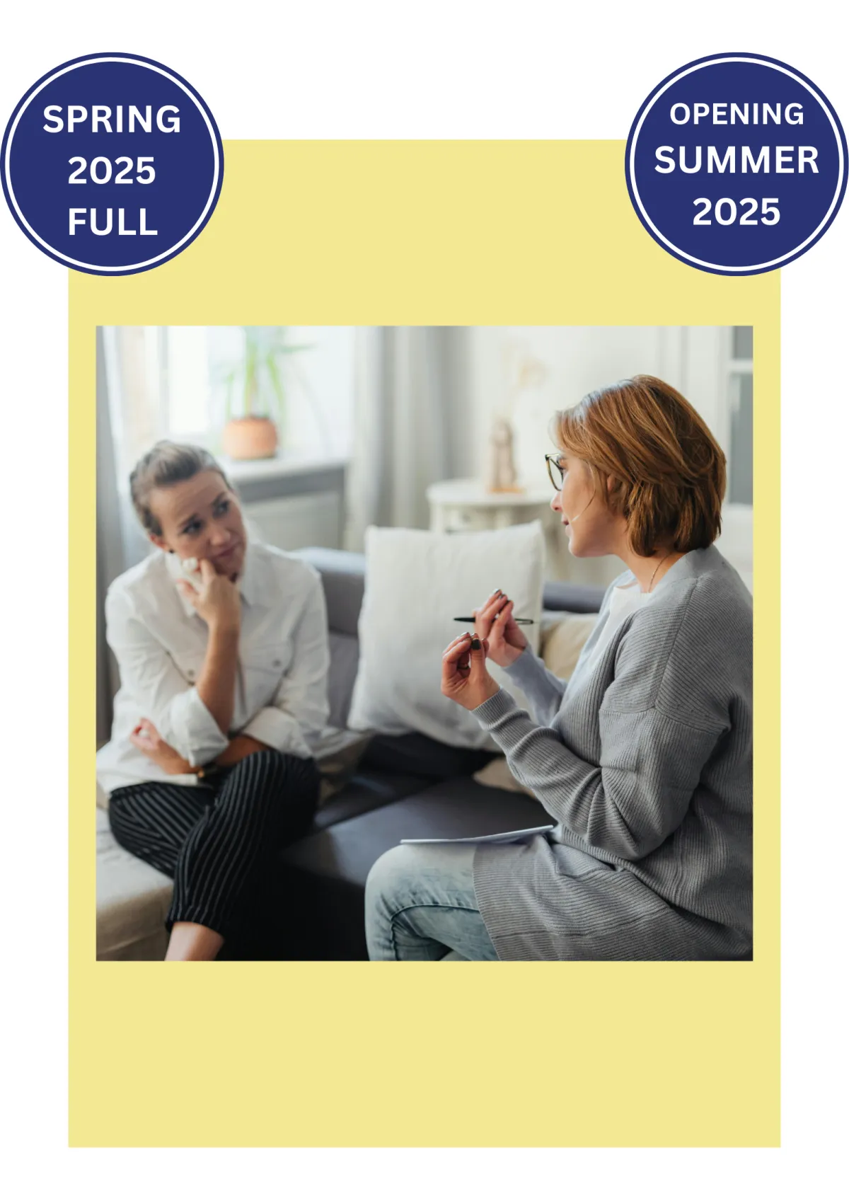 A woman engages in a conversation with a therapist in a supportive and professional setting.