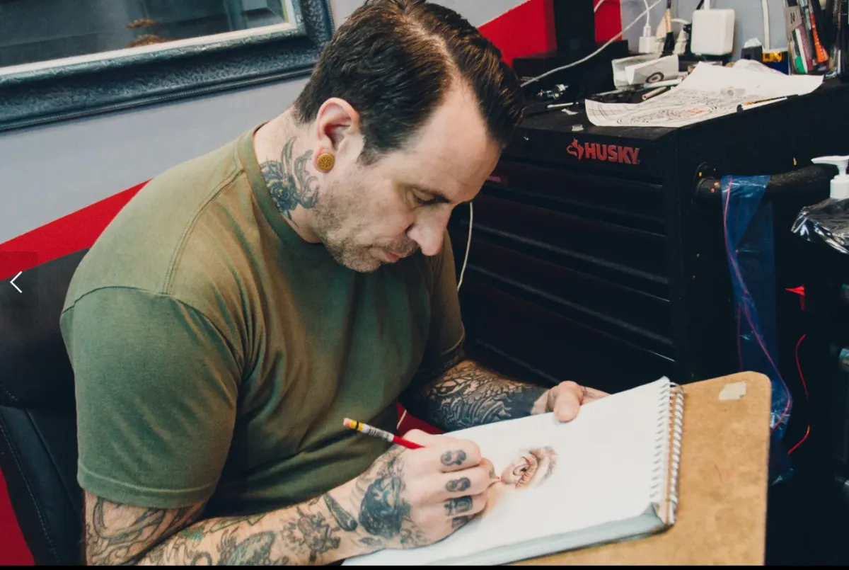 Custom tattoo by Tim Davis at Rose & Dagger Tattoo