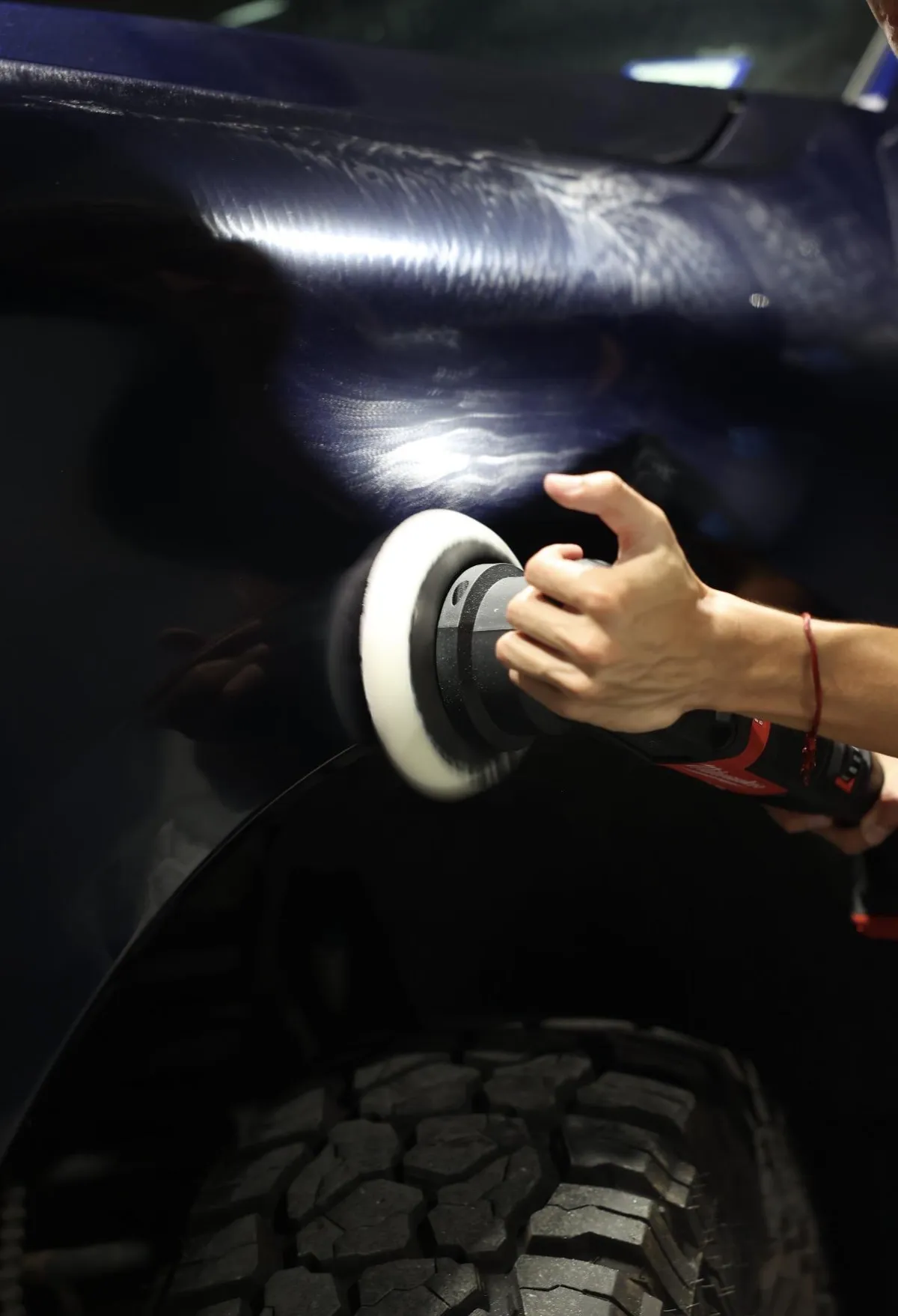 a person wearing gloves and a glove
