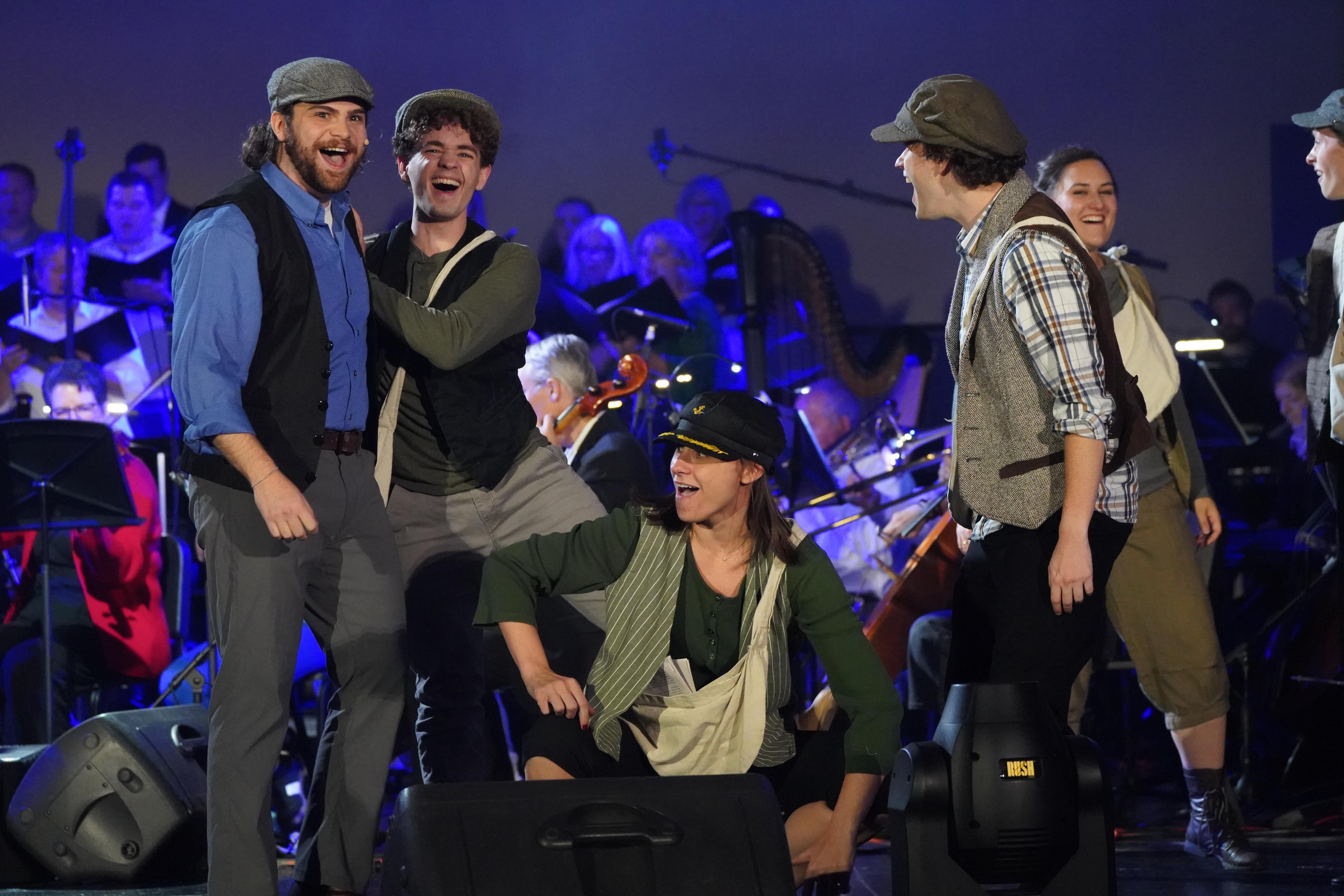Audience enjoying a concert in warm lighting
