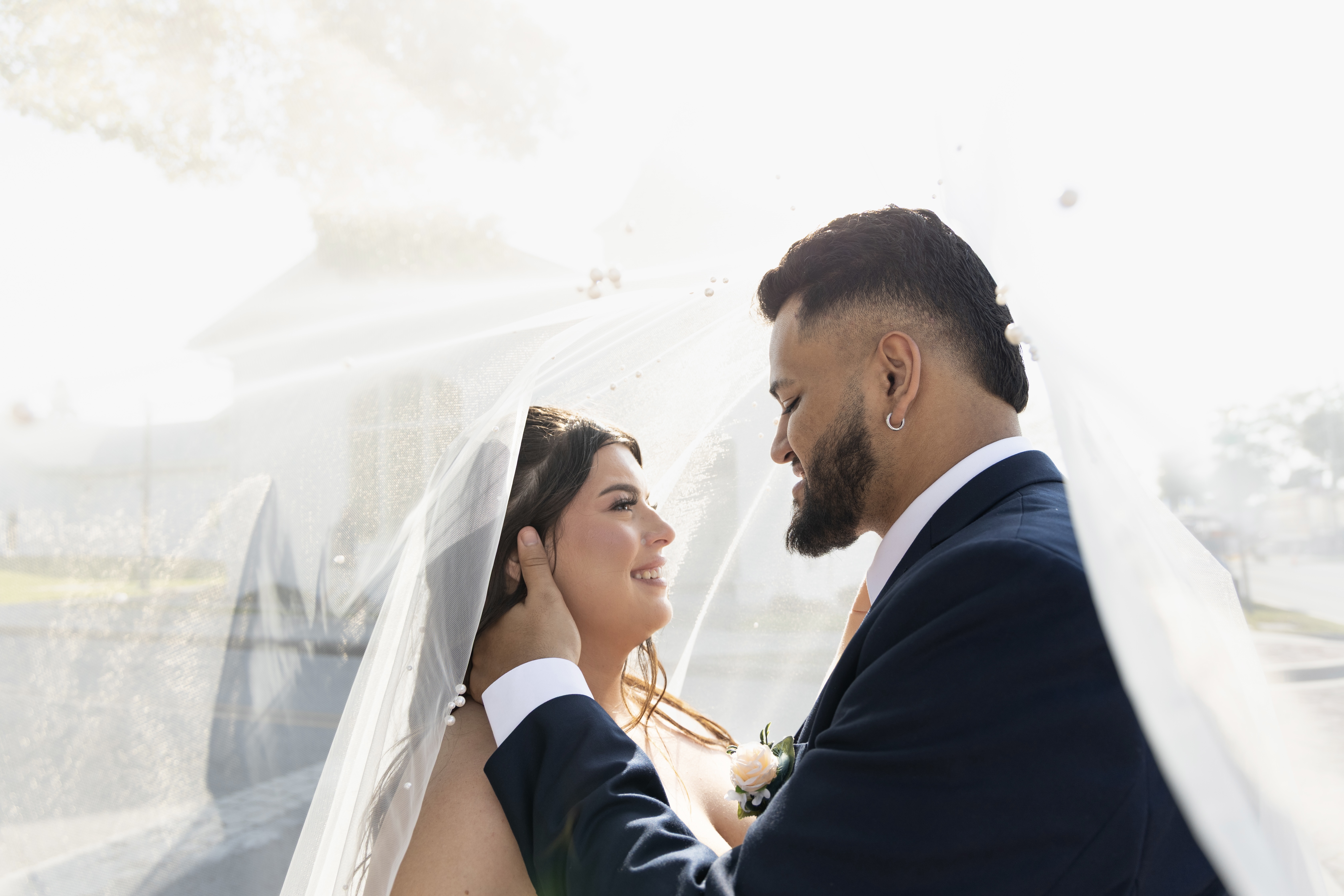 Future bride covering her mouth in shock during proposal photography session