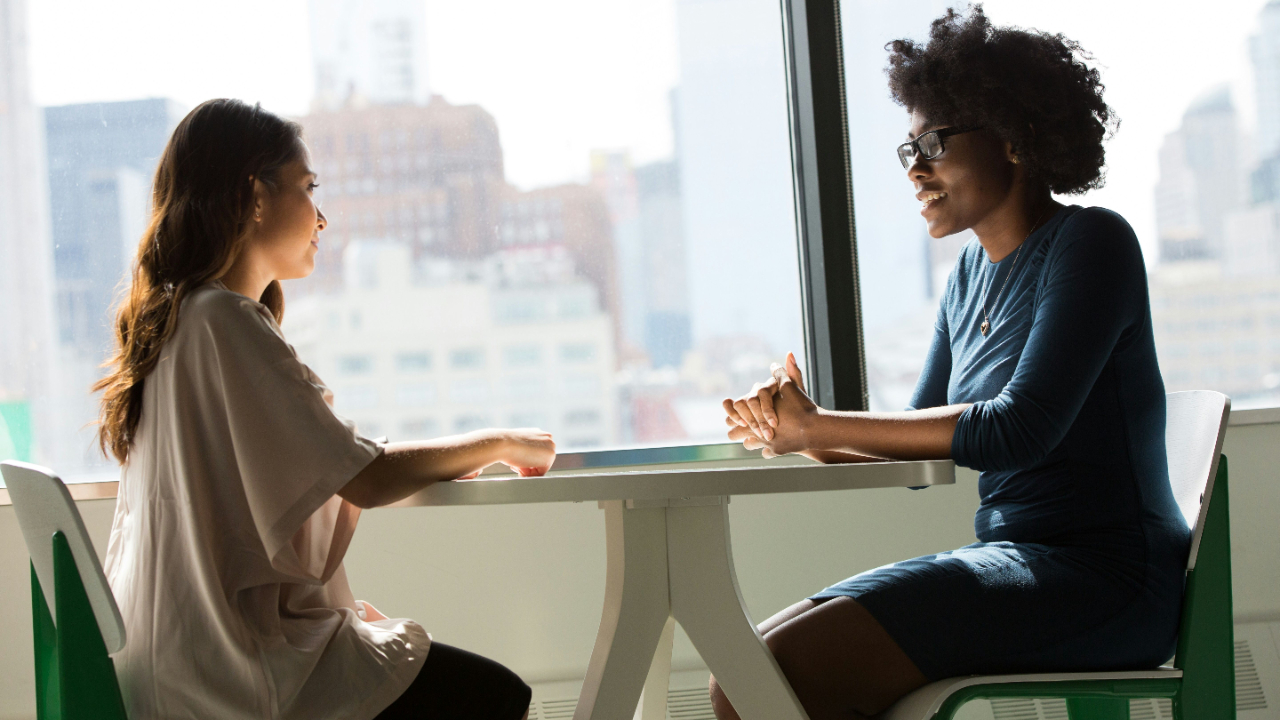 Illustration showing effective communication through thoughtful phrasing in difficult workplace conversations