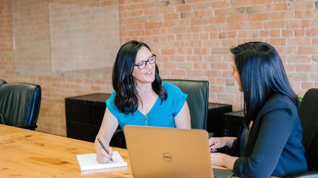 Manager holding a productive one-on-one meeting with an employee