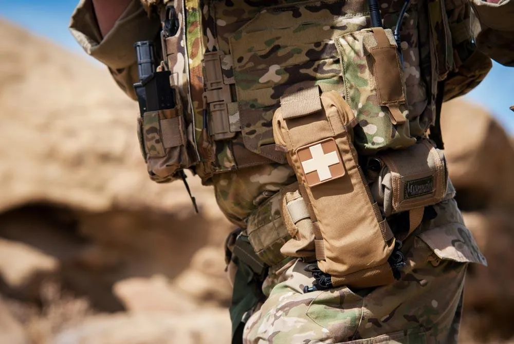 Soldier wearing first aid kit
