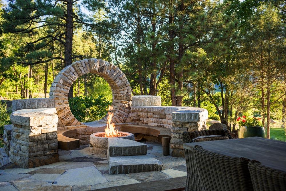 Custom outdoor firepit with dry stacked rock work