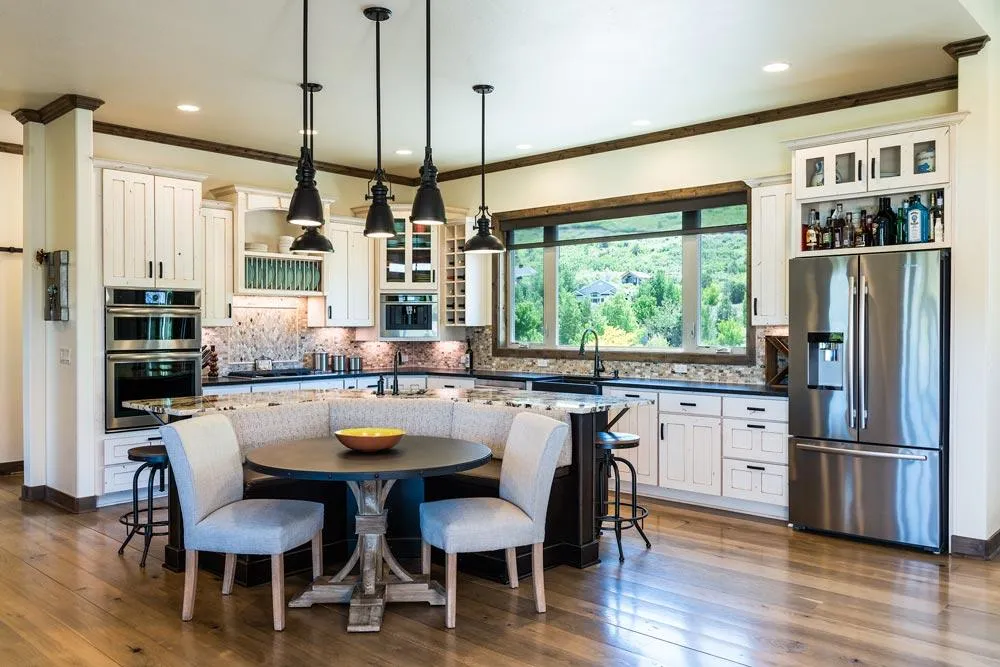 Real estate image of large white kitchen
