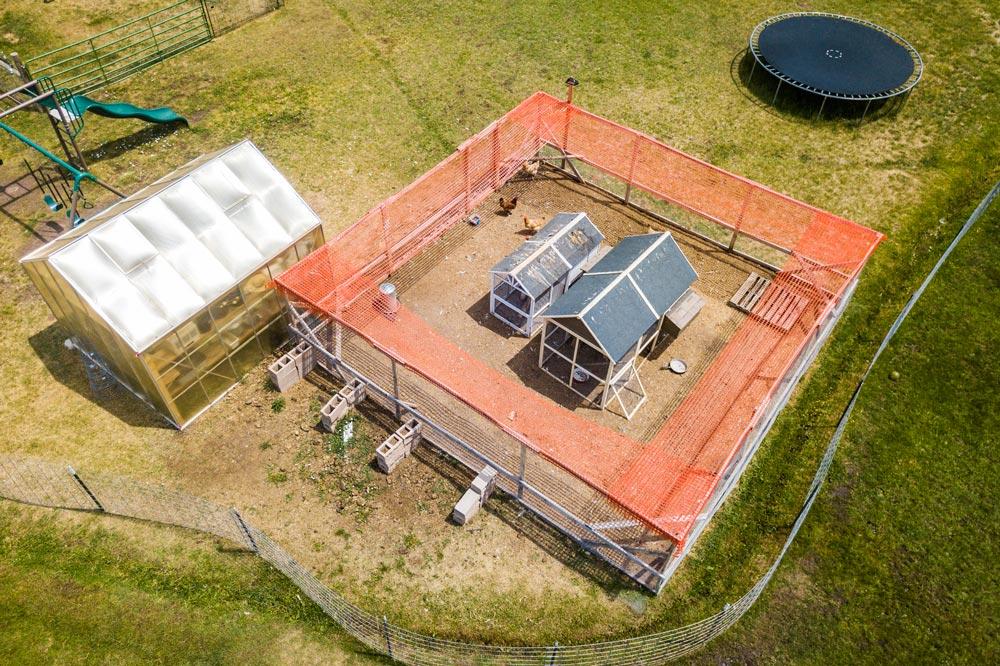Overhead view of chicken run and greenhouse
