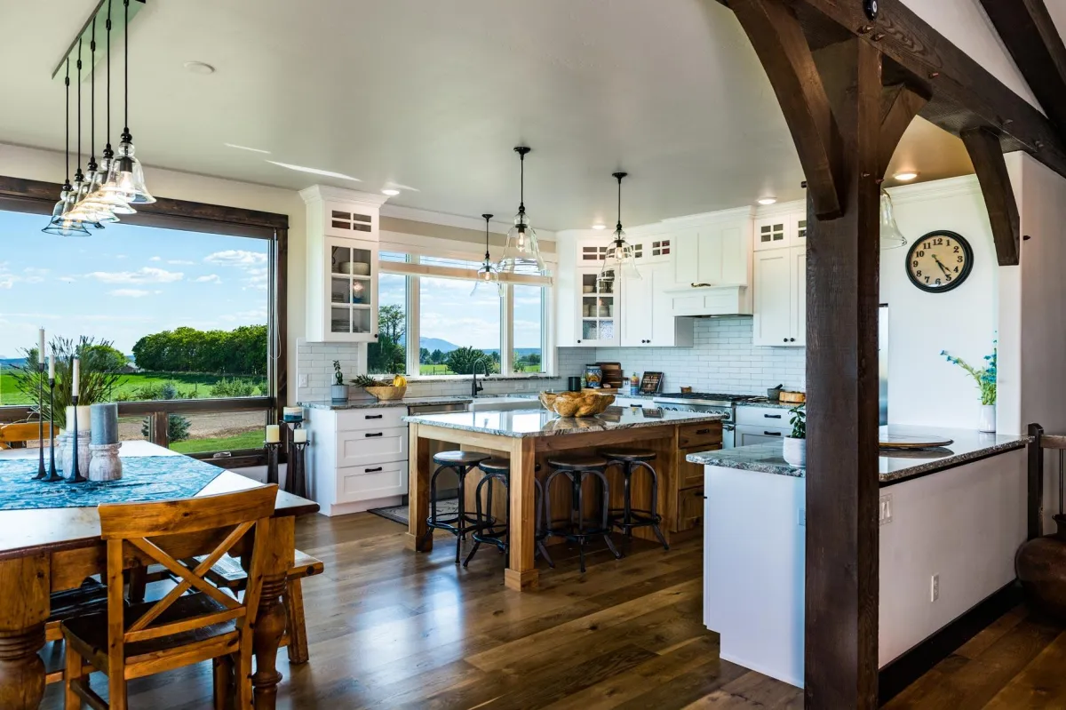 Real estate image of large white kitchen