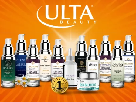 Close-up of Niora VelvetGlow Serum bottle with gold accents on white background.