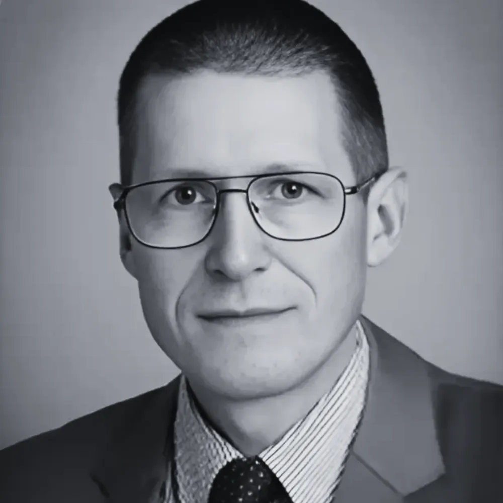 Portrait of Tim Dittmer, Healthcare Economist.