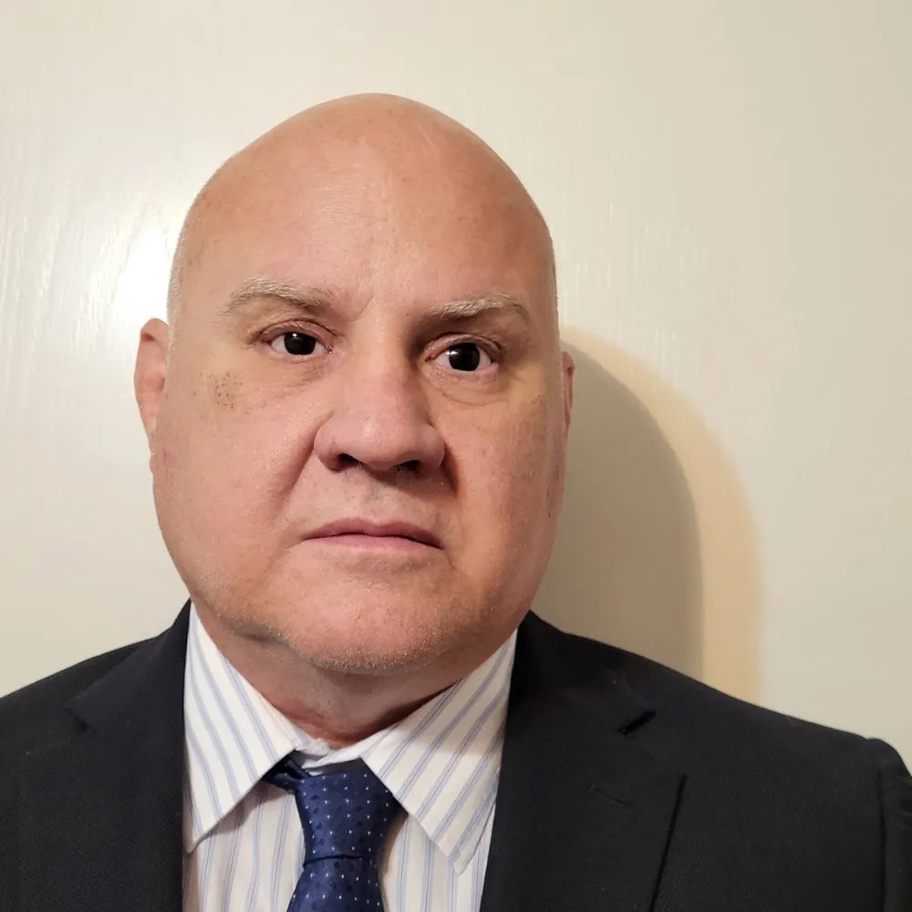 Portrait of Chris Hoffman, Executive Leadership and Services Expert.