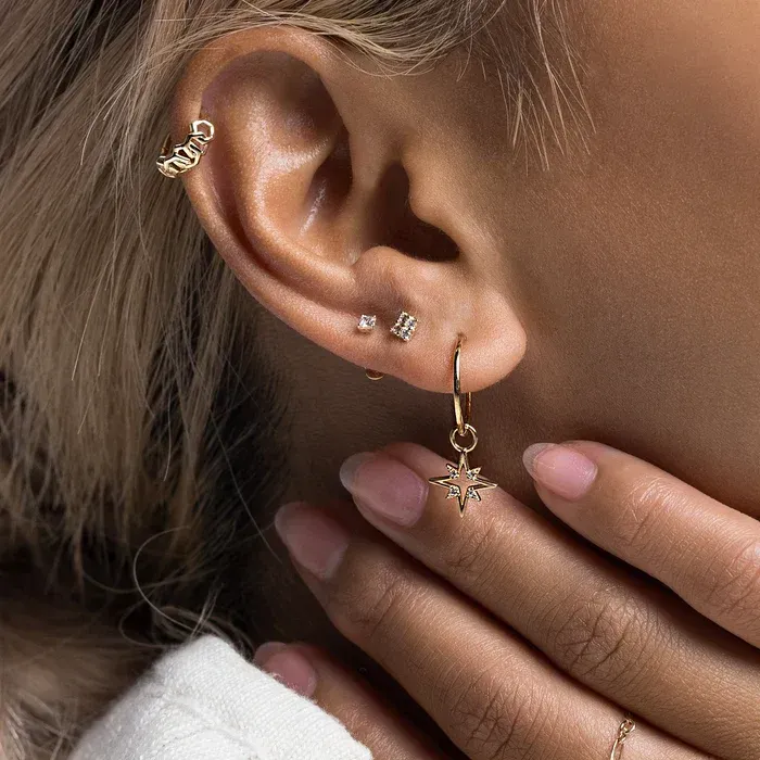 Young woman with dark hair and red lipstick
