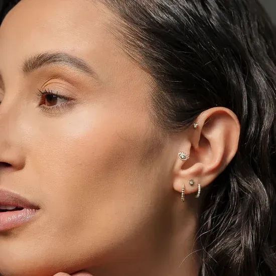 person in black leather gloves