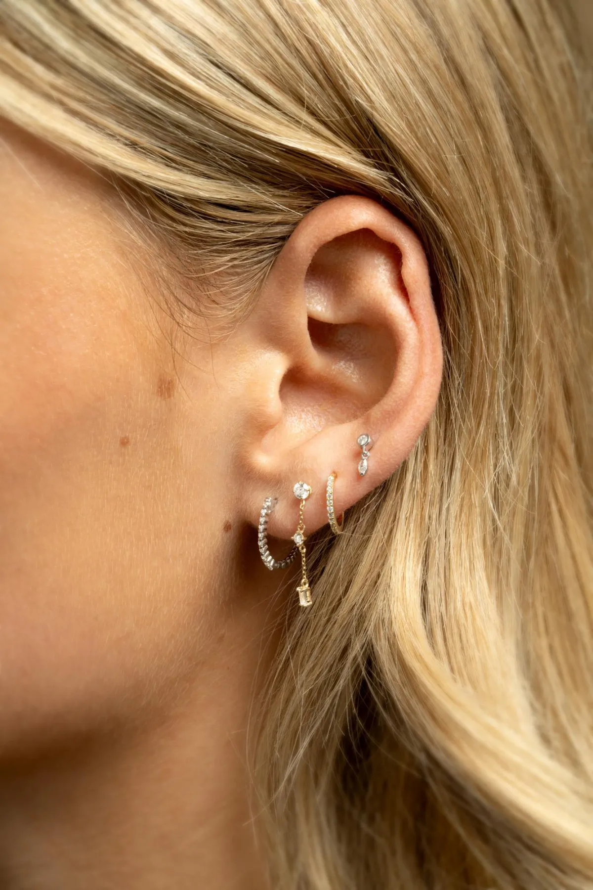 person in black leather gloves