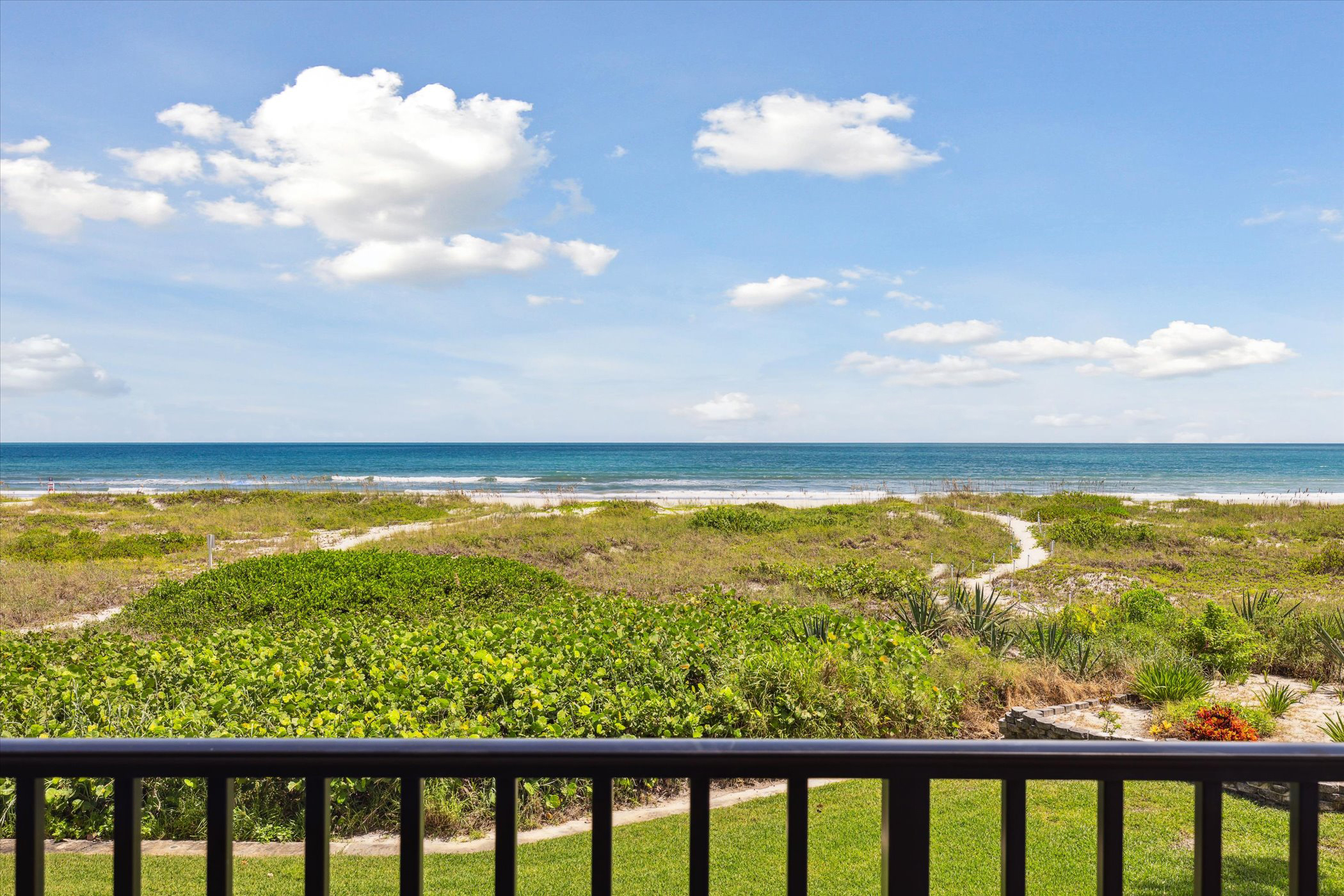 Cocoa Beach dune walkover and ocean view near beachside condos
