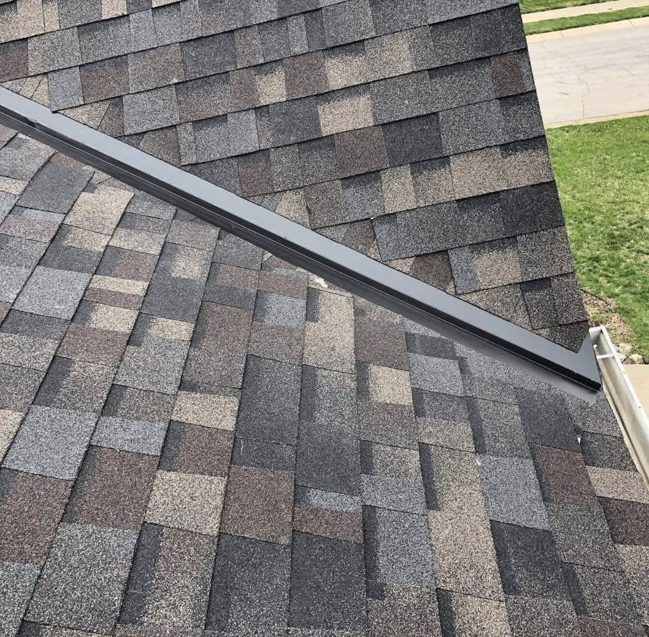 a roof with a few shingles