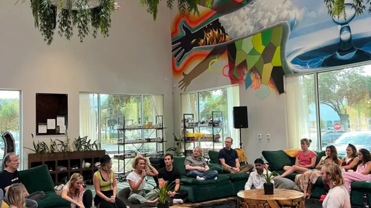 Danielle Aubrey Smith on stage, guiding emotional growth in live event