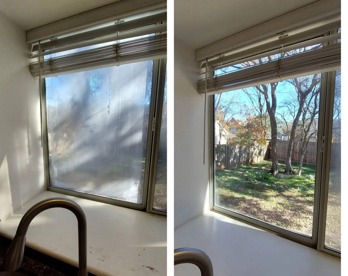 A Glass Rehab technician precisely installing a new insulated glass unit into an existing pristine frame