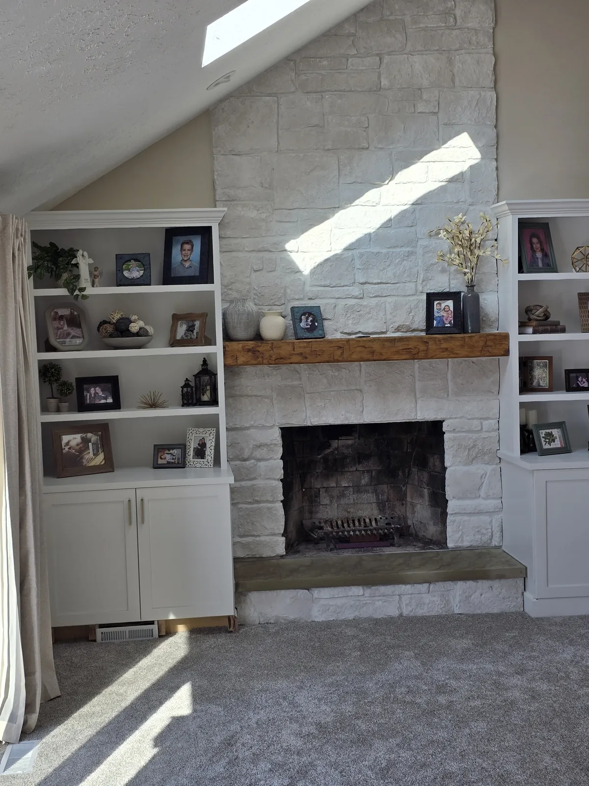 Finished basement family room with built-in shelving