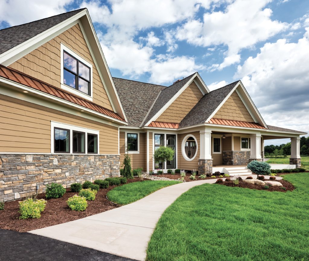 Residential window installation showcasing fiberglass, wood, and vinyl windows by AOA Window & Door