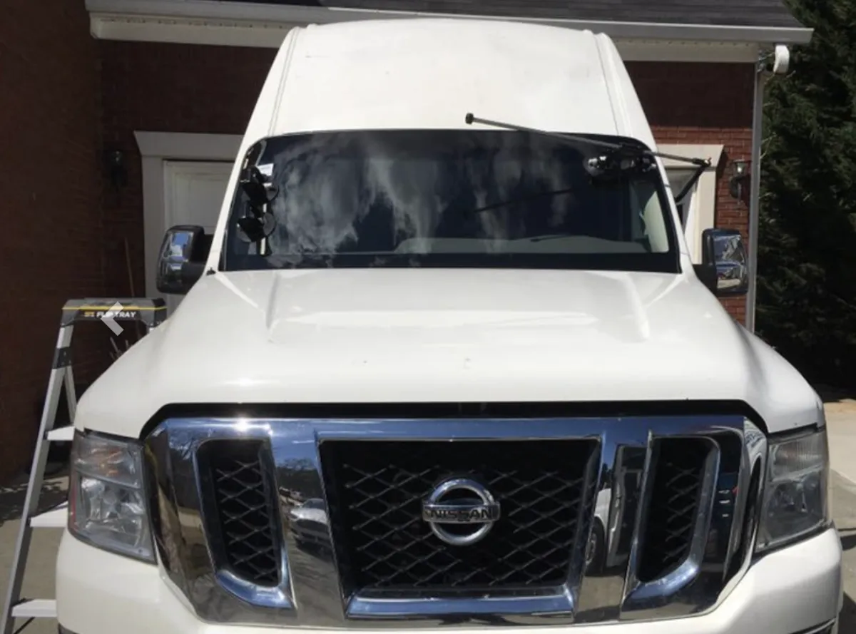 Close-up of rock chip repair on windshield