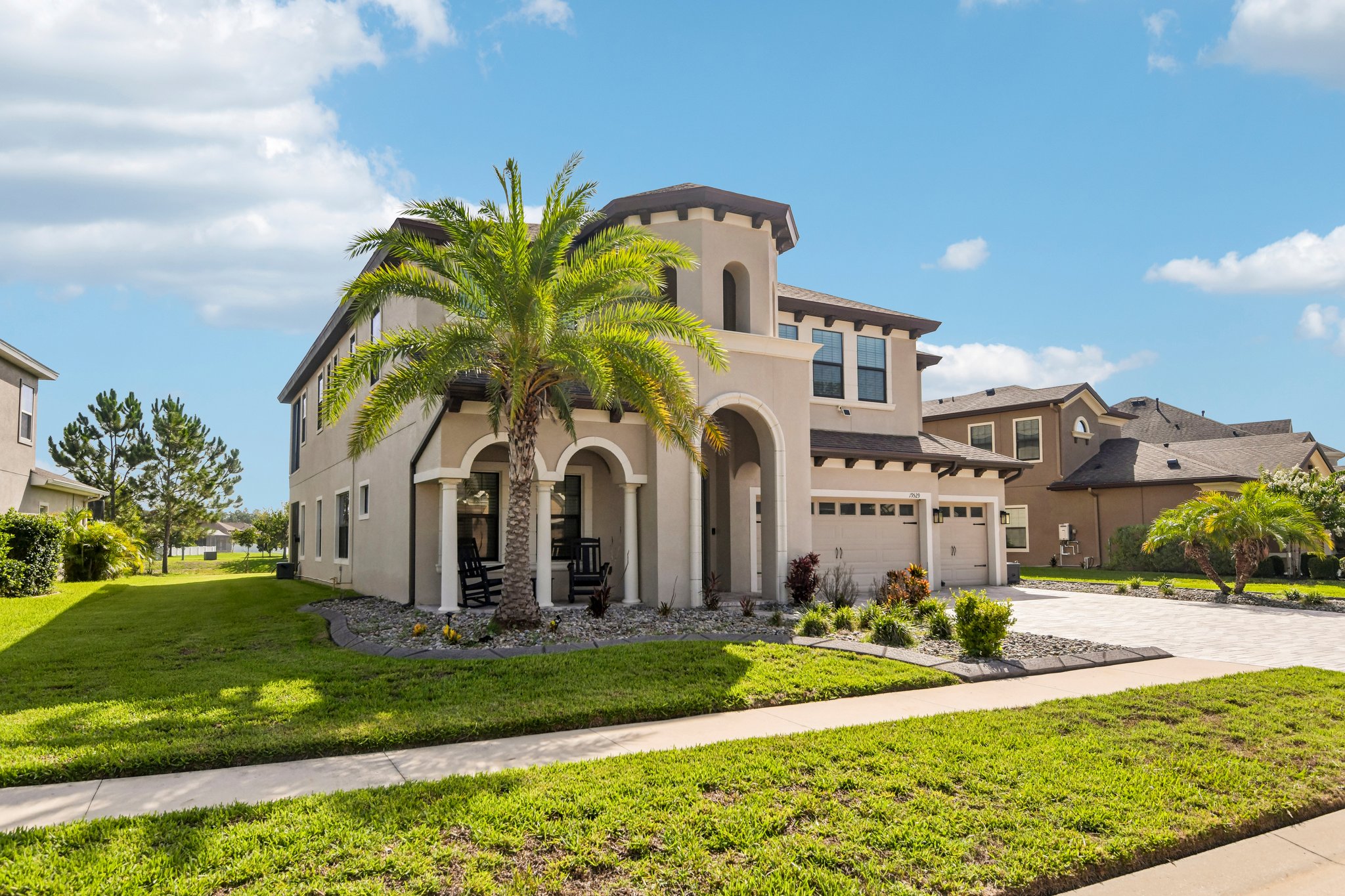 Two-story home with two primary suites at 19529 Hayden Lake Ct in Lakeshore Ranch, Land O' Lakes, FL 34638