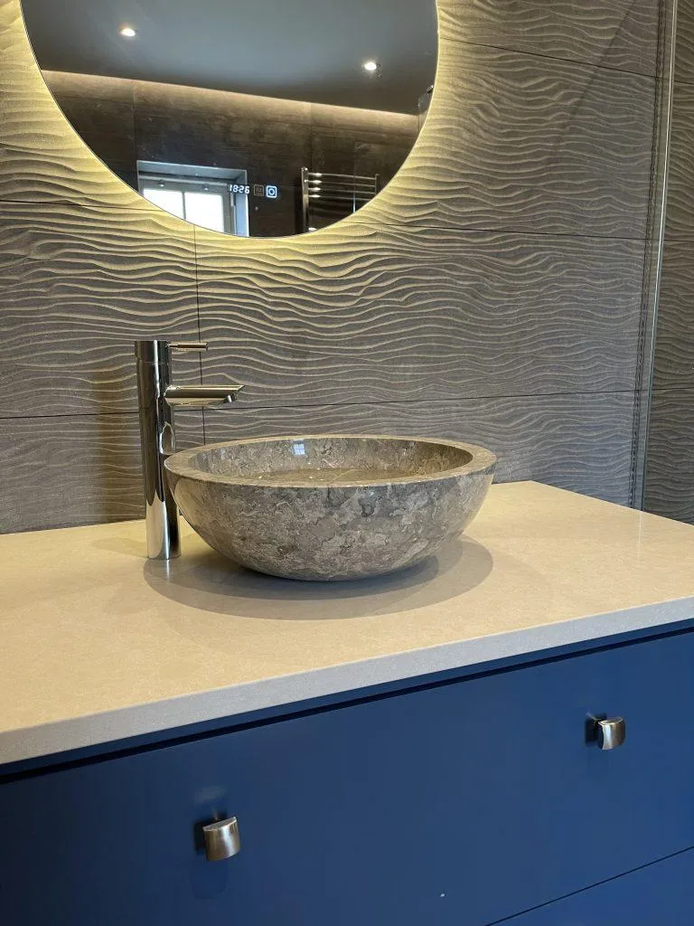 white ceramic sink with faucet