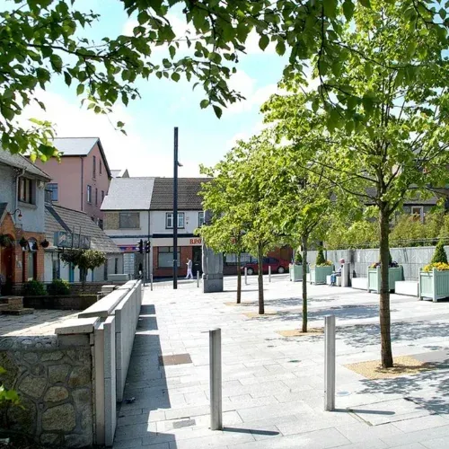 Tallaght town centre street with trees and paving, an area served by Quick Fix Removals Dublin