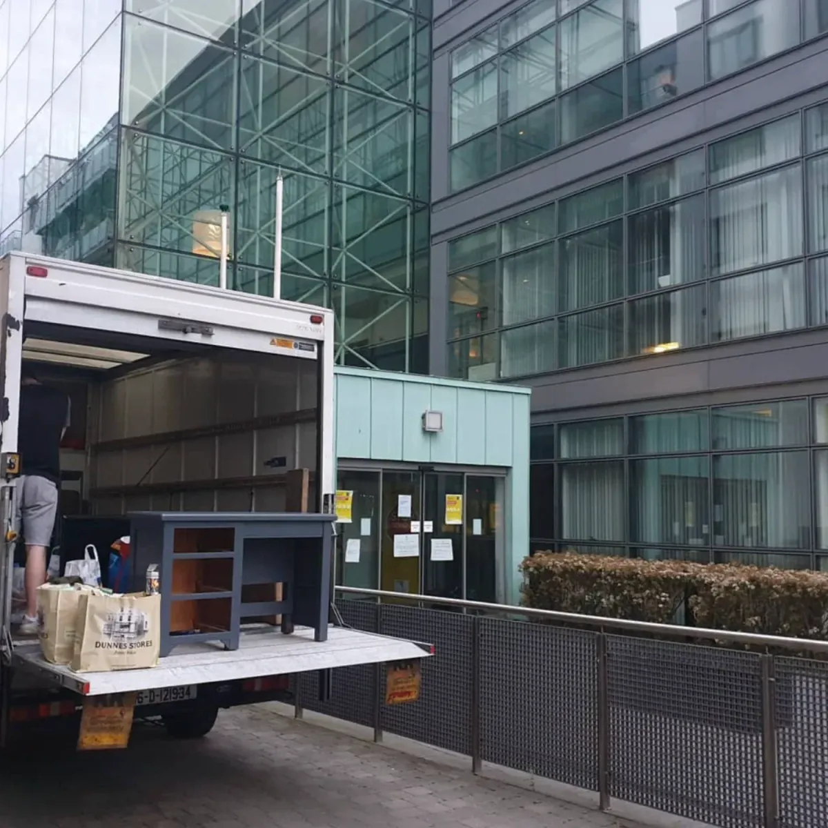 Quick Fix Removals fleet of moving vans outside a home in Dublin