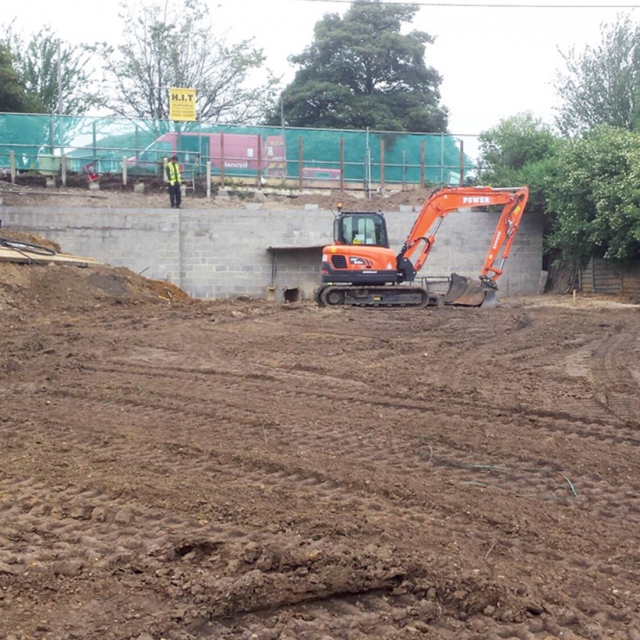 Groundworks and foundations in Caversham with trenches dug and drainage being laid