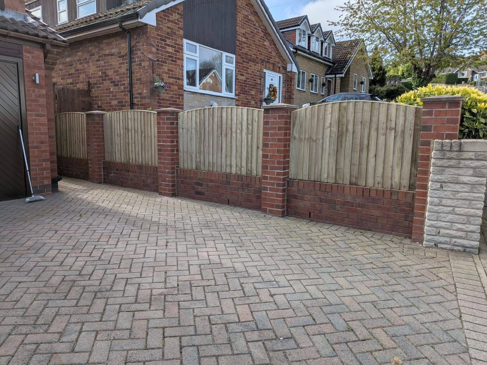 Fencing installation in Wimborne fitting new closeboard panels along a boundary