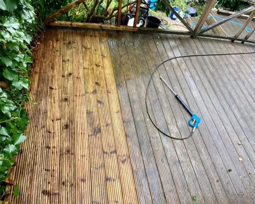 Decking cleaning in Wimborne washing algae off timber boards to make them safe