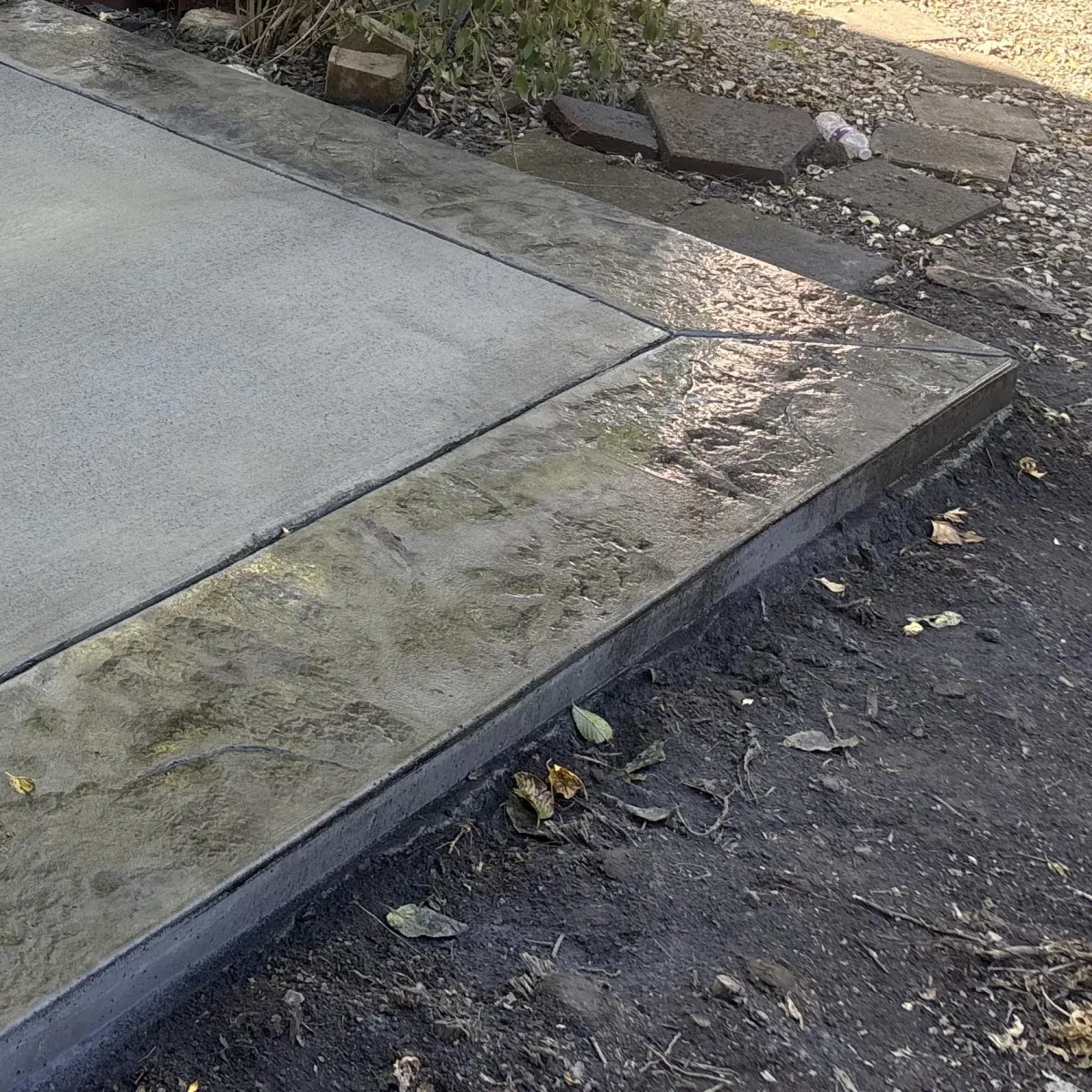 All Pro Concrete team working on stamped patio in Olathe, KS