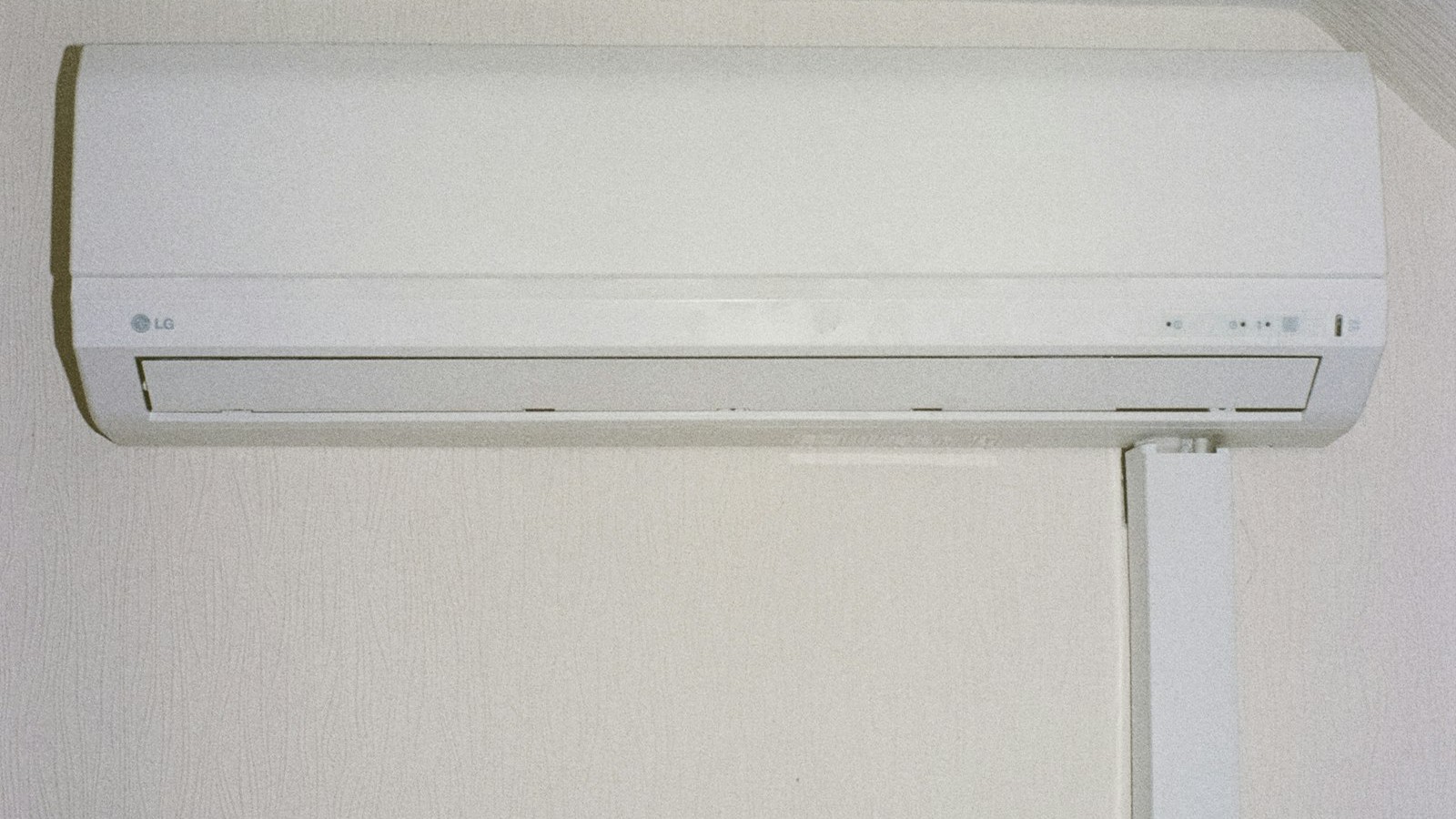 Wall-mounted ductless mini-split indoor head in a converted room, the cheaper fix for a Cape Coral garage or lanai conversion
