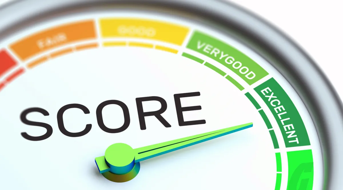 Close-up of a credit score gauge with a needle pointing towards the 'Very Good' and 'Excellent' sections, showing a positive credit rating.