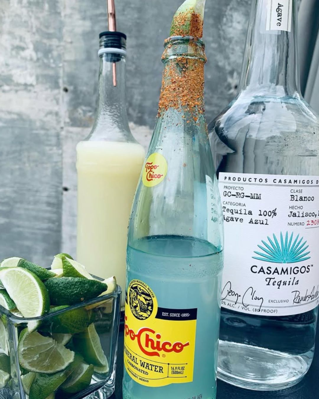 different bottles with limes at mobile bar dallas