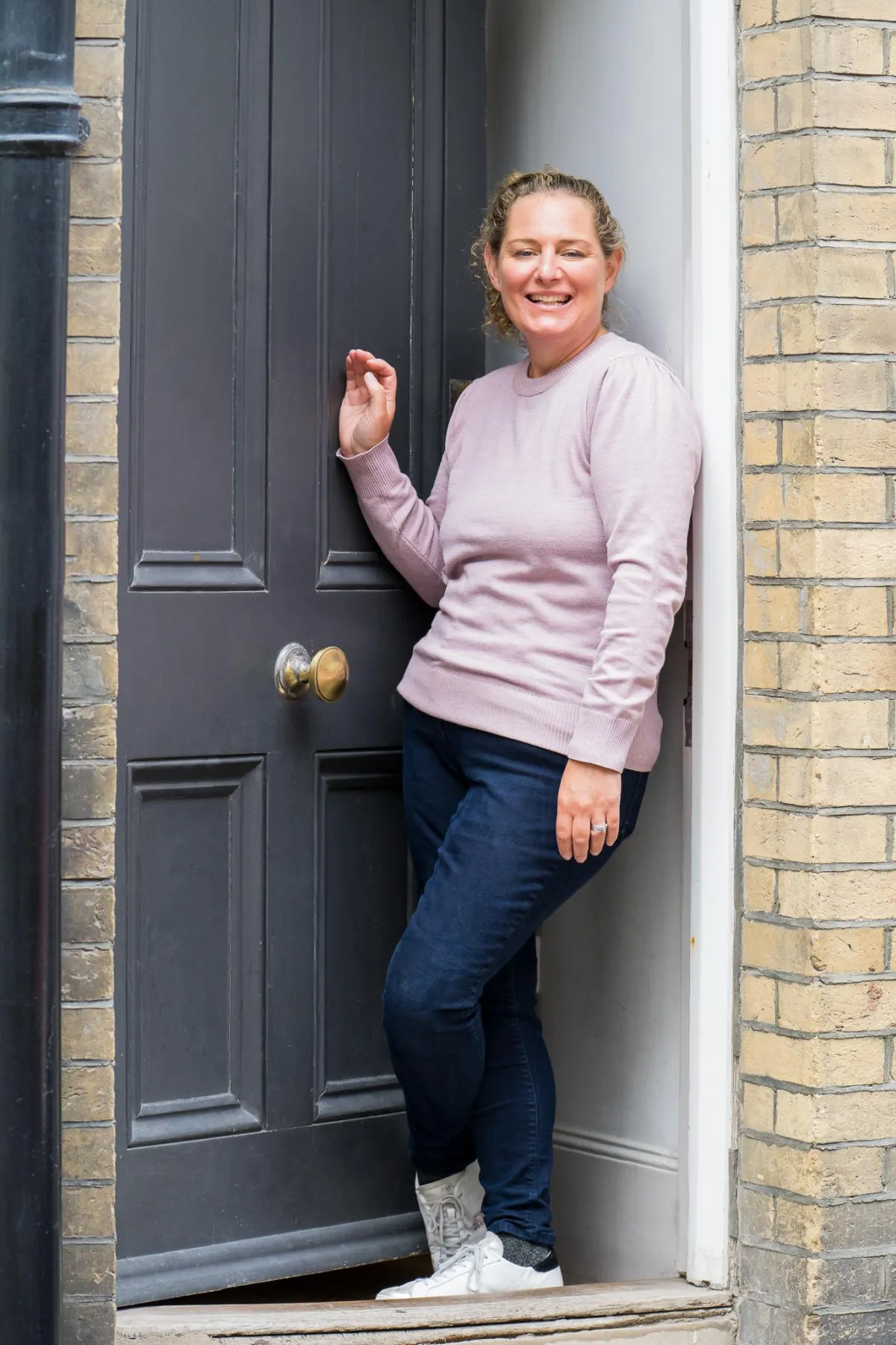 Frankie at the door welcoming you in